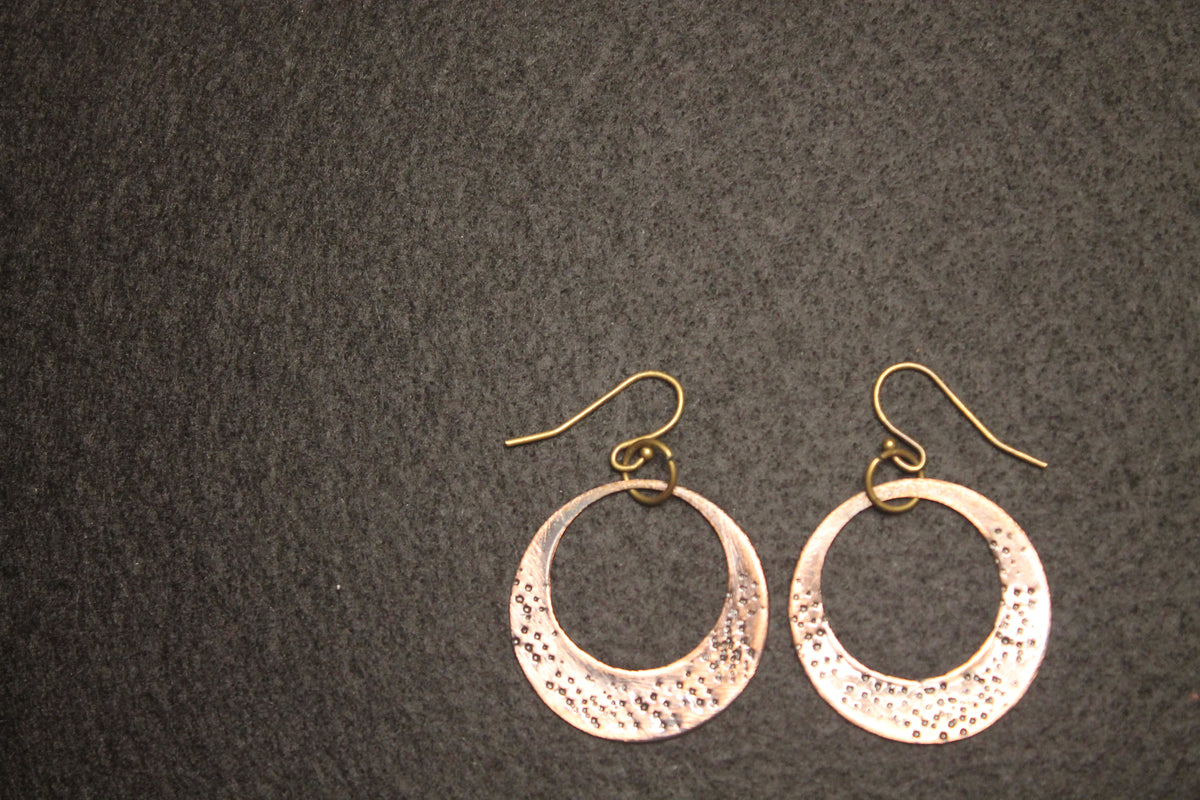 Hammered open circle drop earrings with antique brass fish hook wires